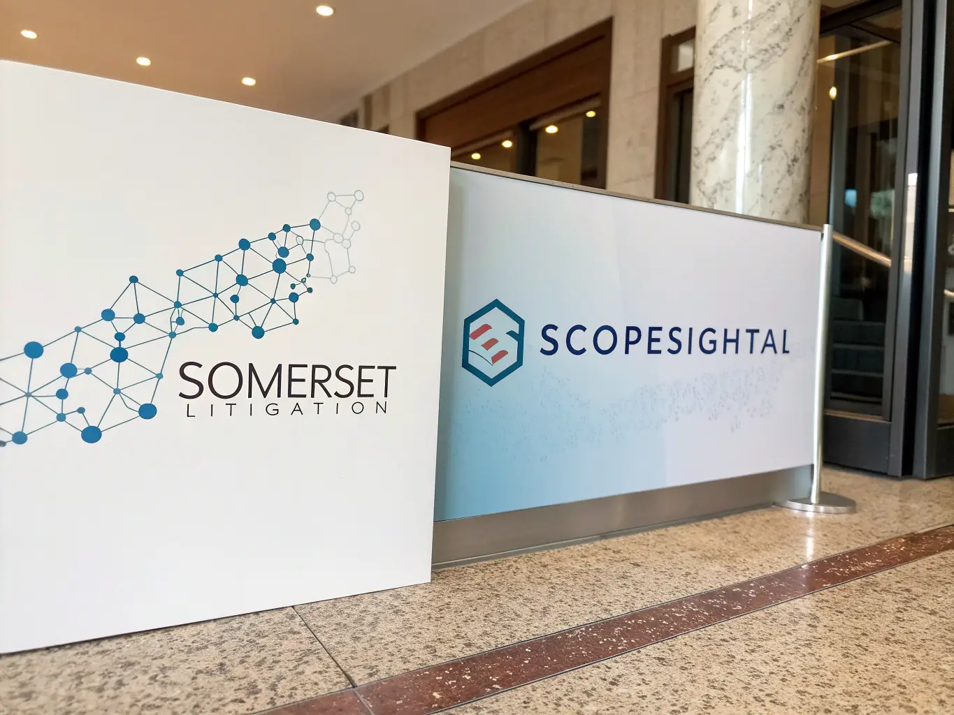 An image showcasing the Somerset Litigation logo alongside the ScopeSightAI logo, symbolizing a strong partnership for comprehensive legal and technical support.
